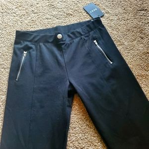 Teen DKNY SIZE L black pants, NWT.  Side silver zipper pocket accents.